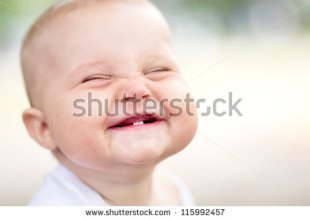stock-photo-beautiful-smiling-cute-baby-115992457