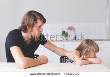 stock-photo-young-bearded-father-arguing-with-his-daughter-in-preschool-age-girl-looking-sad-and-does-not-want-496312129