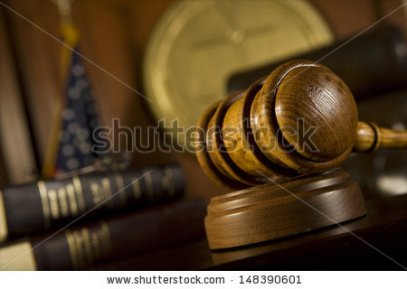 stock-photo-closeup-of-gavel-in-court-room-148390601